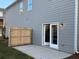 Private patio with new concrete and wooden fence at 3311 Cranston Ln, Kennesaw, GA 30144