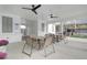 Covered patio area with tables and ceiling fans at 3311 Cranston Ln, Kennesaw, GA 30144