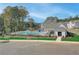 An elevated view of the pool area with a pool house with plenty of seating available for residents at 3311 Cranston Ln, Kennesaw, GA 30144