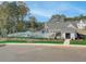 Community pool with clubhouse and ample seating at 3311 Cranston Ln, Kennesaw, GA 30144