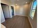 Spacious spare bedroom with hardwood floors and natural light at 3311 Cranston Ln, Kennesaw, GA 30144