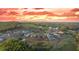 Aerial view of the community at sunset. A premier neighborhood with mature landscaping at 237 Laurel Vista Dr, Canton, GA 30114