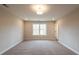 Spacious bedroom with neutral walls and plush carpeting at 3305 Cranston Ln, Kennesaw, GA 30144