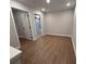 Bright hallway with doors to bedrooms and closet at 3305 Cranston Ln, Kennesaw, GA 30144