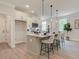 Modern kitchen with island, white cabinets, and stainless steel appliances at 3305 Cranston Ln, Kennesaw, GA 30144