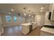 Modern kitchen with white cabinets and island at 3305 Cranston Ln, Kennesaw, GA 30144