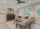 Living room with comfy seating and large windows at 3305 Cranston Ln, Kennesaw, GA 30144