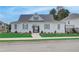 Whitewashed pool house with grey shutters and landscaping at 3305 Cranston Ln, Kennesaw, GA 30144