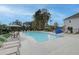 Community pool with lounge chairs and umbrellas at 3305 Cranston Ln, Kennesaw, GA 30144