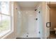 Large walk-in shower with white tile and glass enclosure at 3305 Cranston Ln, Kennesaw, GA 30144