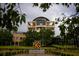 Kennesaw State University's Kennesaw Hall is shown with tree branches in the foreground at 3305 Cranston Ln, Kennesaw, GA 30144