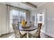 Charming breakfast nook with window views and wood table at 155 Sunshower Rdg, Canton, GA 30114