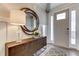 Bright entryway with decorative mirror, console table, and stylish lamp at 155 Sunshower Rdg, Canton, GA 30114