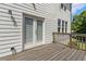 Private deck with French doors leading to the backyard at 253 N Gwinnett St, Buford, GA 30518