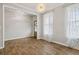 Formal dining room with hardwood floors and a chandelier at 253 N Gwinnett St, Buford, GA 30518