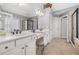 Elegant bathroom with double vanity, large mirror, and a separate shower at 5507 Ashleigh Walk Nw Dr, Suwanee, GA 30024