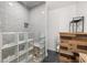 Modern bathroom with gray tile shower and glass block partition at 5507 Ashleigh Walk Nw Dr, Suwanee, GA 30024