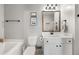 Clean bathroom with white vanity and bathtub at 3135 Bernauer Trce, Atlanta, GA 30360