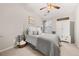 Bedroom with white dresser and ceiling fan at 3135 Bernauer Trce, Atlanta, GA 30360