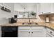 Kitchen with granite countertops and white cabinets at 3135 Bernauer Trce, Atlanta, GA 30360