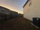 Fenced backyard with a view of neighboring houses at 4461 Ravenwood Dr, Union City, GA 30291