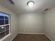 Cozy bedroom with a window and neutral wall colors at 4461 Ravenwood Dr, Union City, GA 30291