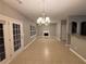 Spacious living room featuring a fireplace and tile floors at 4461 Ravenwood Dr, Union City, GA 30291