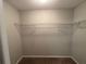 Large walk-in closet with wire shelving at 4461 Ravenwood Dr, Union City, GA 30291