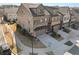 Townhome community view, showcasing homes and landscaping at 1072 Heyward Way, Alpharetta, GA 30009