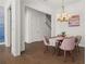 Elegant dining room featuring a chandelier and hardwood floors at 1072 Heyward Way, Alpharetta, GA 30009