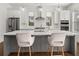 Modern kitchen island with white countertop and gray cabinets at 1072 Heyward Way, Alpharetta, GA 30009