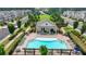 Community pool with surrounding lounge chairs and landscaping at 1072 Heyward Way, Alpharetta, GA 30009