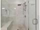 Large walk-in shower with built-in seat and glass enclosure at 1072 Heyward Way, Alpharetta, GA 30009