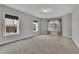 Spacious bedroom with carpet, neutral walls, and multiple windows at 3177 Capriole Dr, Marietta, GA 30062