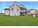 Beautiful backyard with a screened-in porch above the backyard, patio, and lush green lawn at 3177 Capriole Dr, Marietta, GA 30062