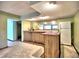 Basement bar with wet bar and cabinets at 1550 Oak Creek Dr, Marietta, GA 30066