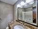 Bathroom with granite countertop and mirror at 1550 Oak Creek Dr, Marietta, GA 30066