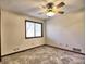 Bright bedroom with window and ceiling fan at 1550 Oak Creek Dr, Marietta, GA 30066