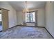 Bright dining room with large window and chandelier at 1550 Oak Creek Dr, Marietta, GA 30066