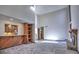 Spacious living room featuring high ceilings, a fireplace, and built-in shelving at 1550 Oak Creek Dr, Marietta, GA 30066