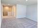 Spacious loft area with plush carpeting, ideal for relaxation or recreation at 2422 Brown Dove Way Lot 70, Grayson, GA 30017