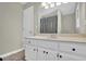 Bathroom with a shower/tub combo, single sink vanity with white cabinets at 4810 Winding Ln, Powder Springs, GA 30127