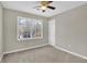 Bedroom with carpet, light gray paint and a ceiling fan at 4810 Winding Ln, Powder Springs, GA 30127