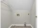 The laundry room has grey paint and vinyl flooring at 4810 Winding Ln, Powder Springs, GA 30127