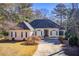 House exterior with driveway and landscaping at 1260 Lakehaven Pkwy, Mcdonough, GA 30253