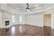 Spacious living room with hardwood floors, high ceilings, and ceiling fan at 1260 Lakehaven Pkwy, Mcdonough, GA 30253