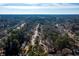 House nestled in a wooded neighborhood, as seen from above at 2107 Penrose Dr, Atlanta, GA 30344