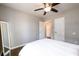 Simple bedroom with hardwood floors and a full-size bed at 2107 Penrose Dr, Atlanta, GA 30344