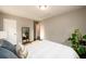 Bright bedroom with a full bed and a large mirror at 2107 Penrose Dr, Atlanta, GA 30344