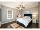 Spacious bedroom with hardwood floors and a comfortable bed at 2107 Penrose Dr, Atlanta, GA 30344